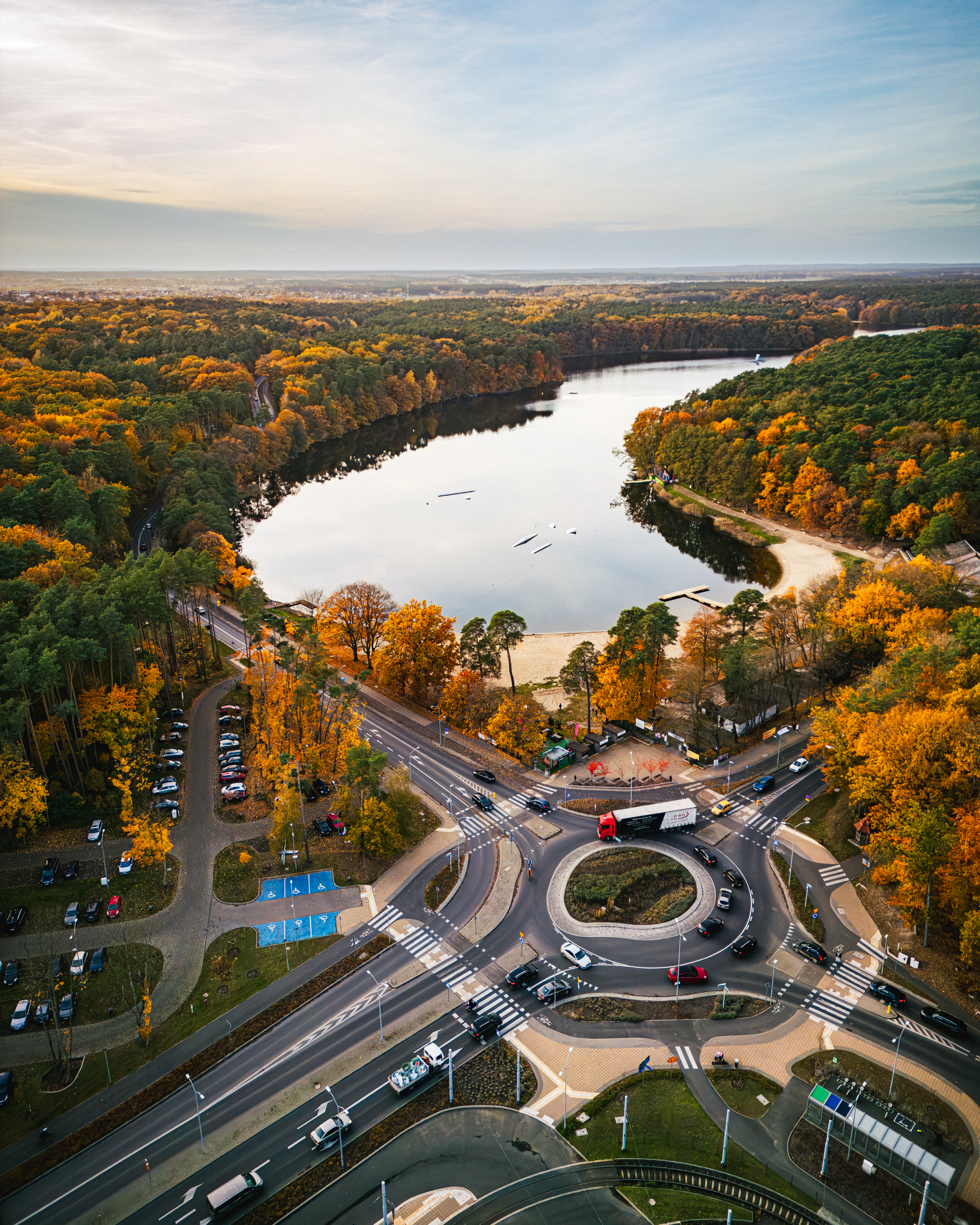 Lake Głębokie Szczecin – surrounded by autumn tree crowns – view from a drone.